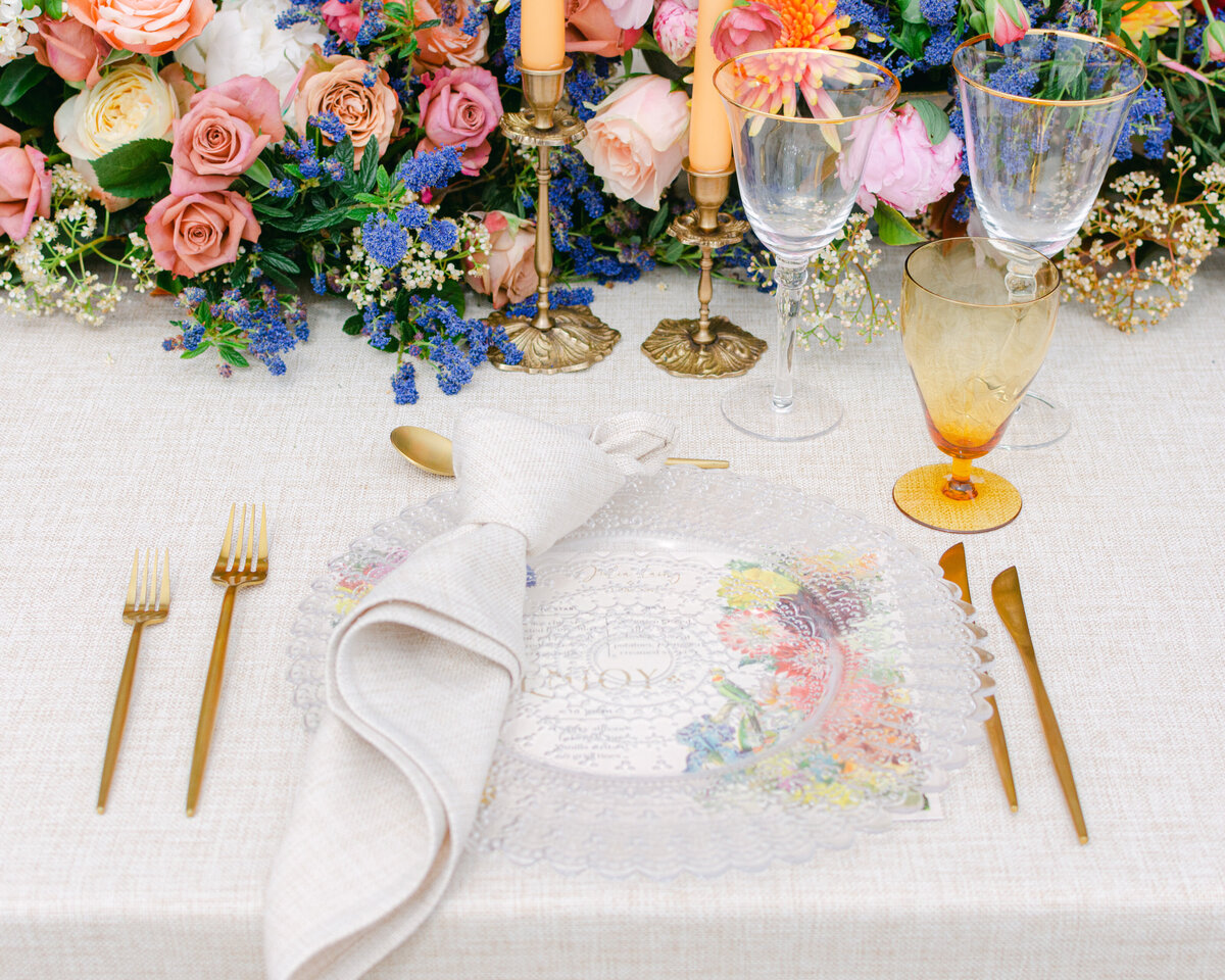Fine art wedding tablescape with beautiful stationery and flowers