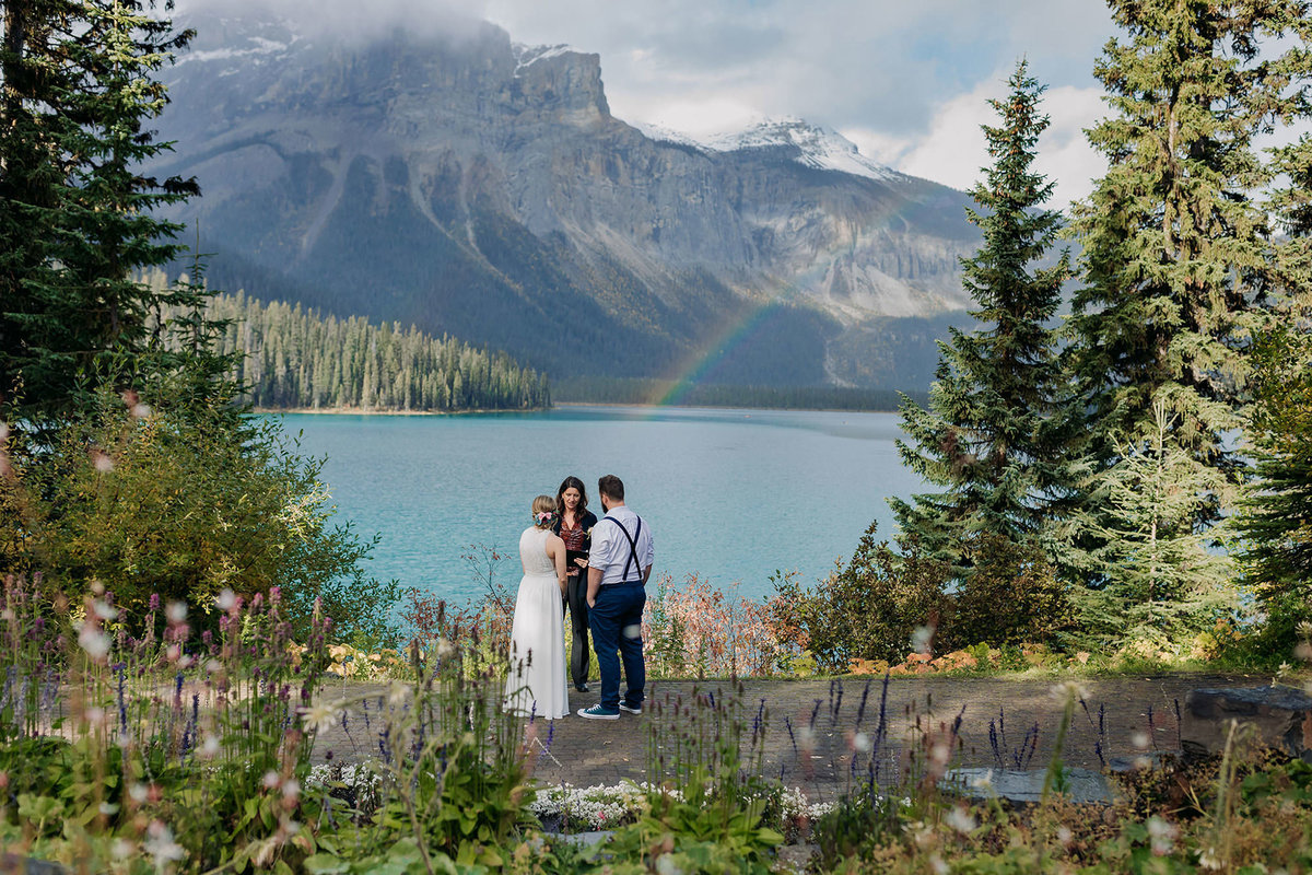 rainbow over emerald lake lodge viewpoint elopement ceremony photographer