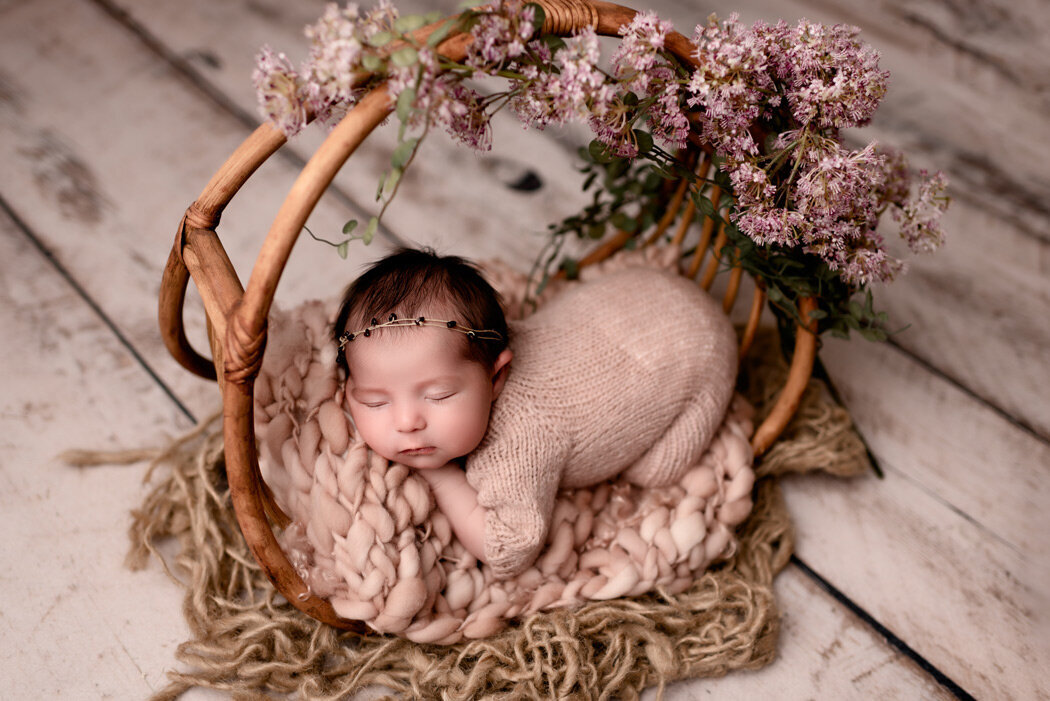 Brighton Newborn Photographer baby laying in basket by For The Love Of Photography