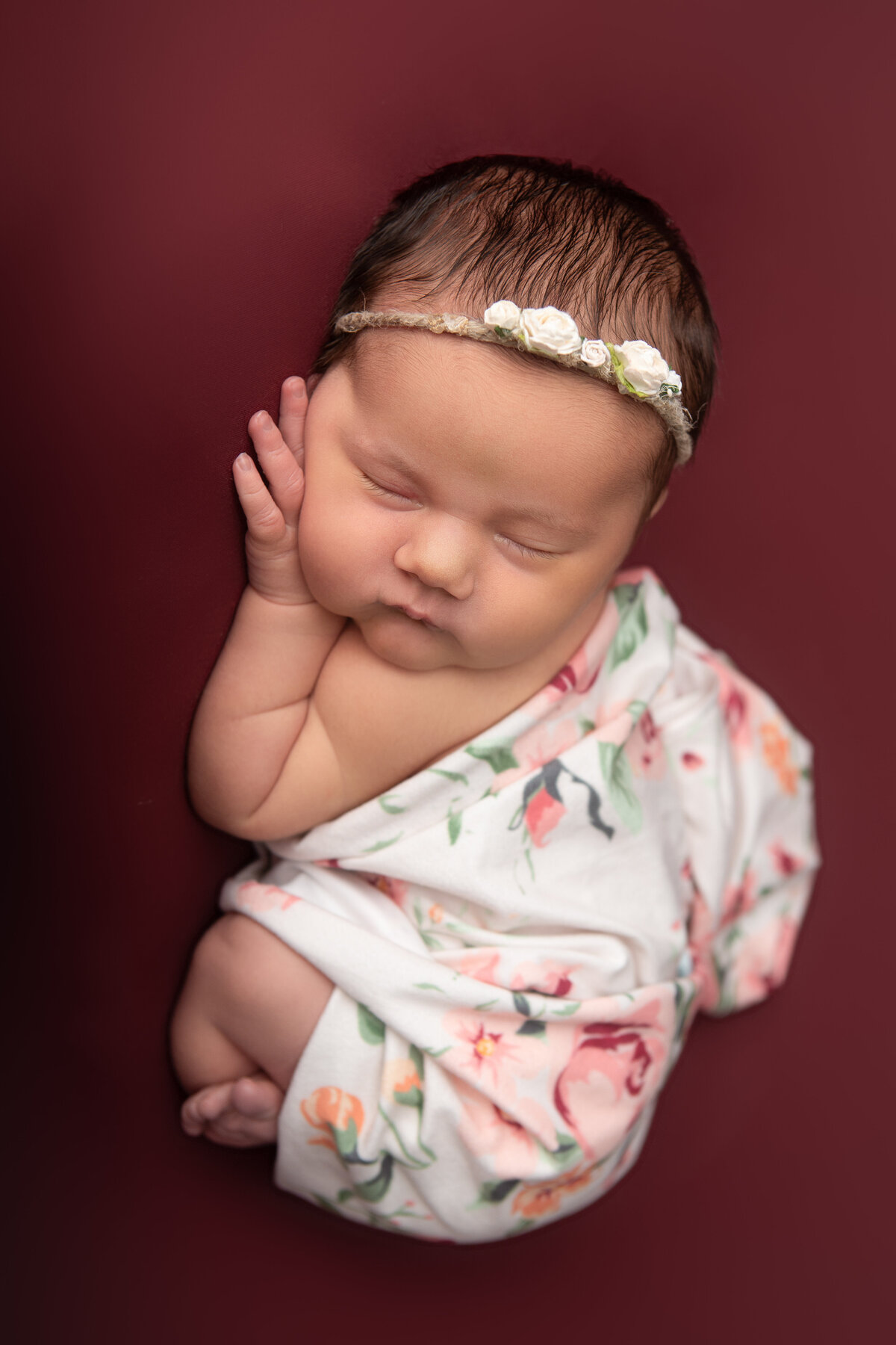 Floral wrapped bum up newborn studio pose