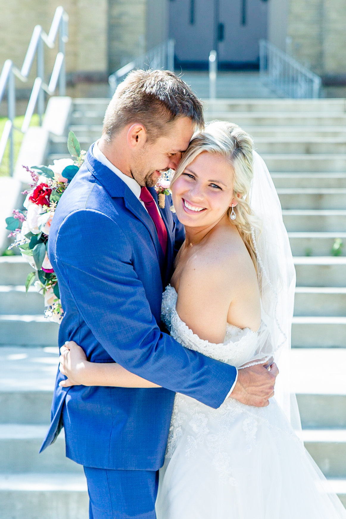 Bride and groom share moment of excitement before wedding