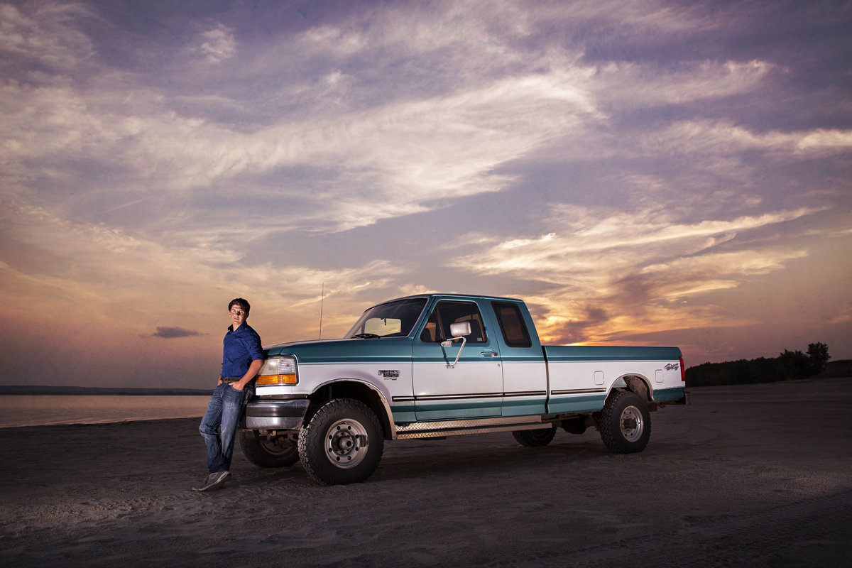 Cool sunset guy senior photo with his pickup