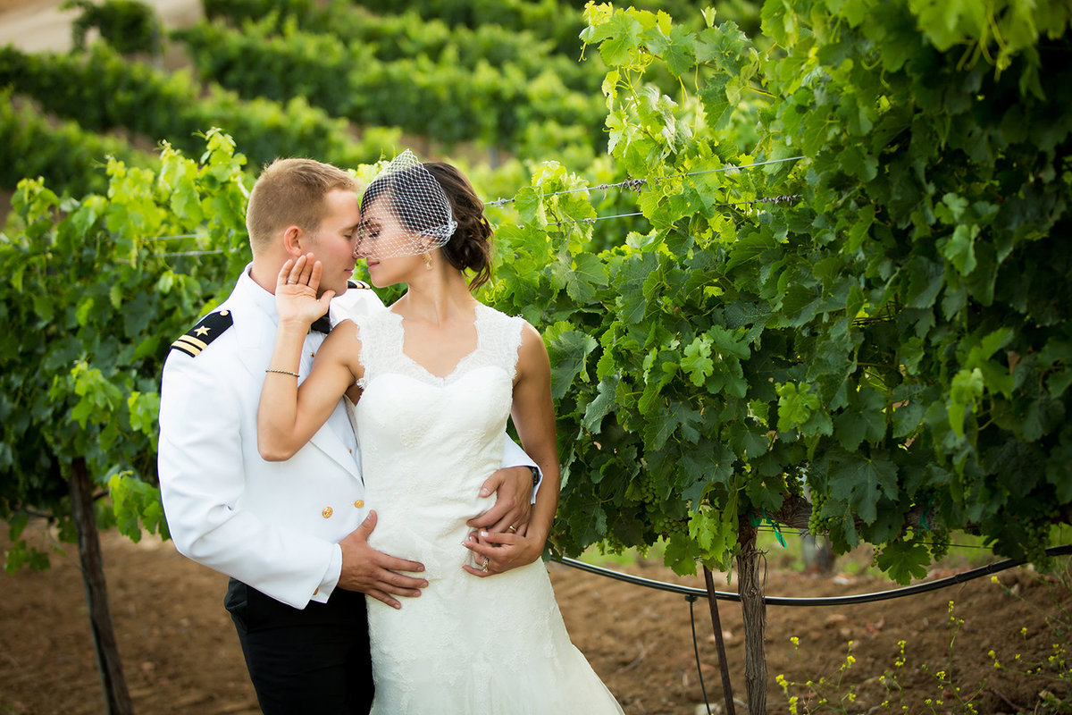 Temecula Winery wedding photos couple in vineyard