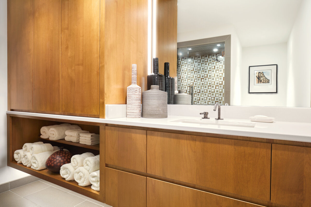 Panageries Residential Interior Design | Pacific NW Modern Dwelling Second Vanity with Towels and custom cabinets for plenty of storage