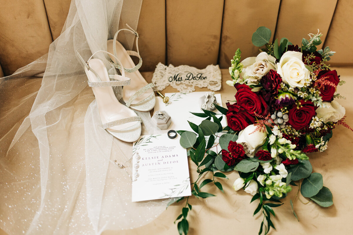 Brides wedding details with bouquet