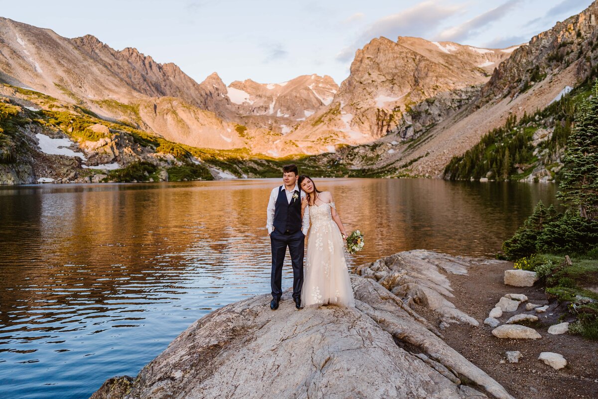 Couple hikes for the sunrise elopement at Lake Isabelle in Boulder, Colorado