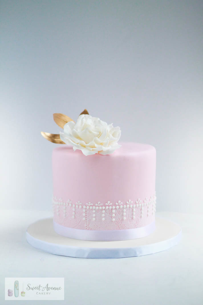 vintage lace pink cake with white sugar peony
