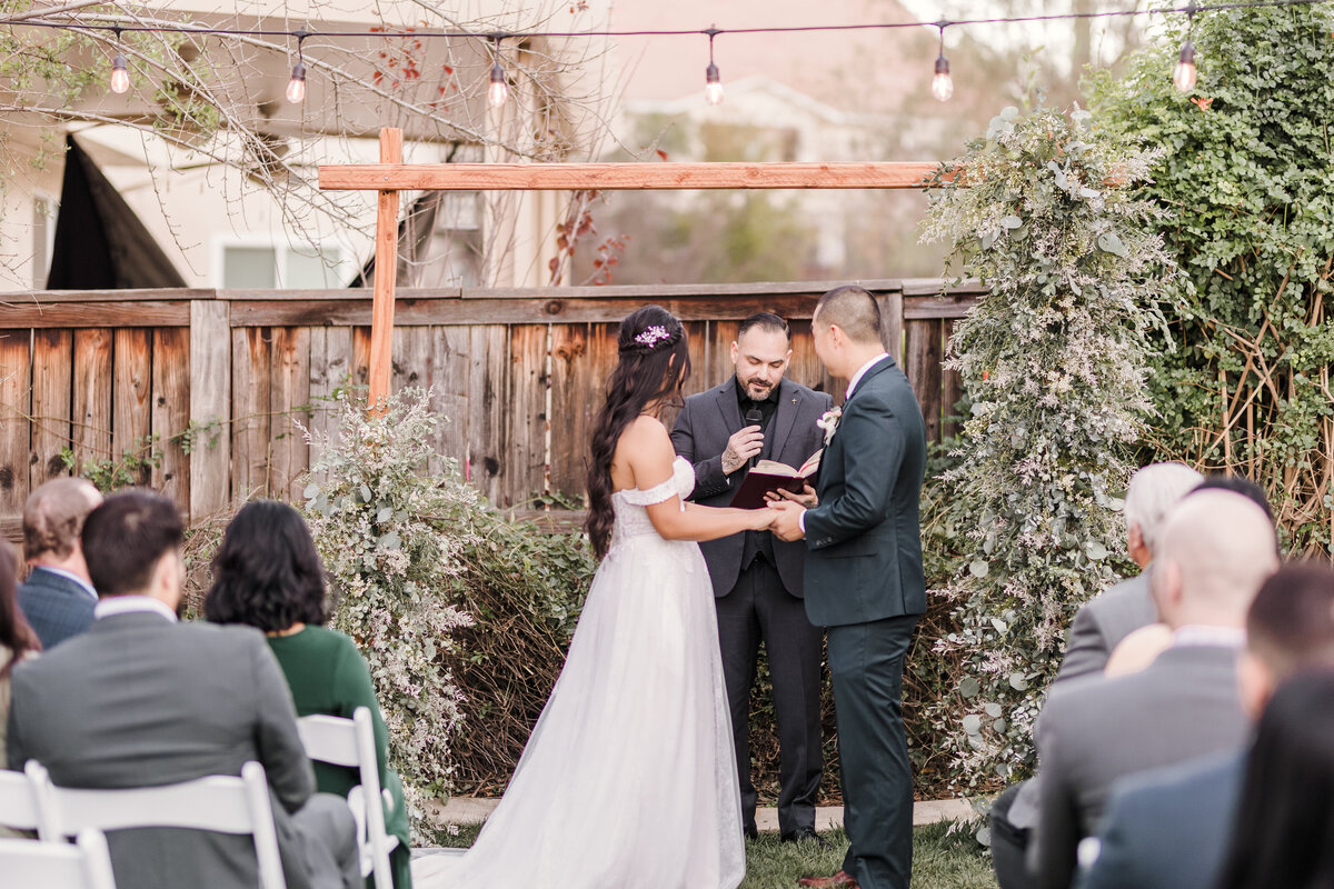 Bride & Groom exchange vows during a private wedding in the inland empire