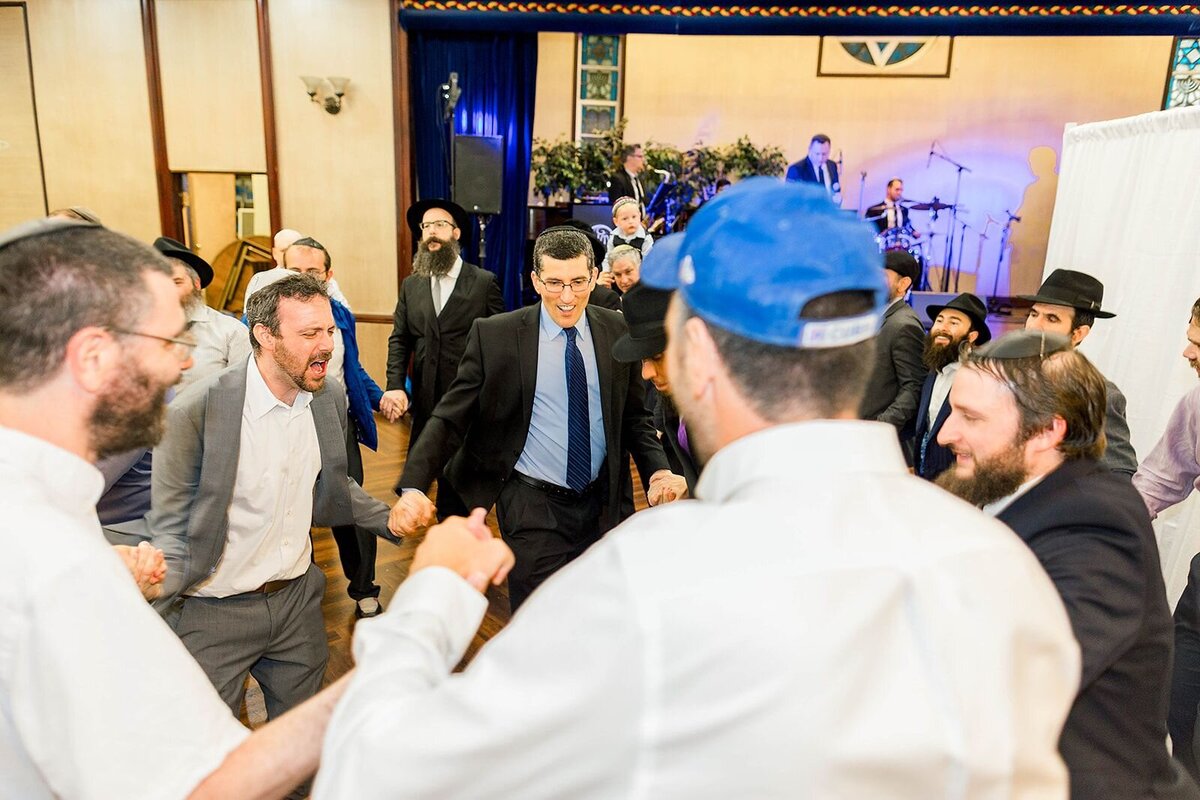 Eliana-Melmed-Photography-Chicago-LosAngeles-Jewish-WeddingPhotographer-CarmiKalman-MensDancing-00013