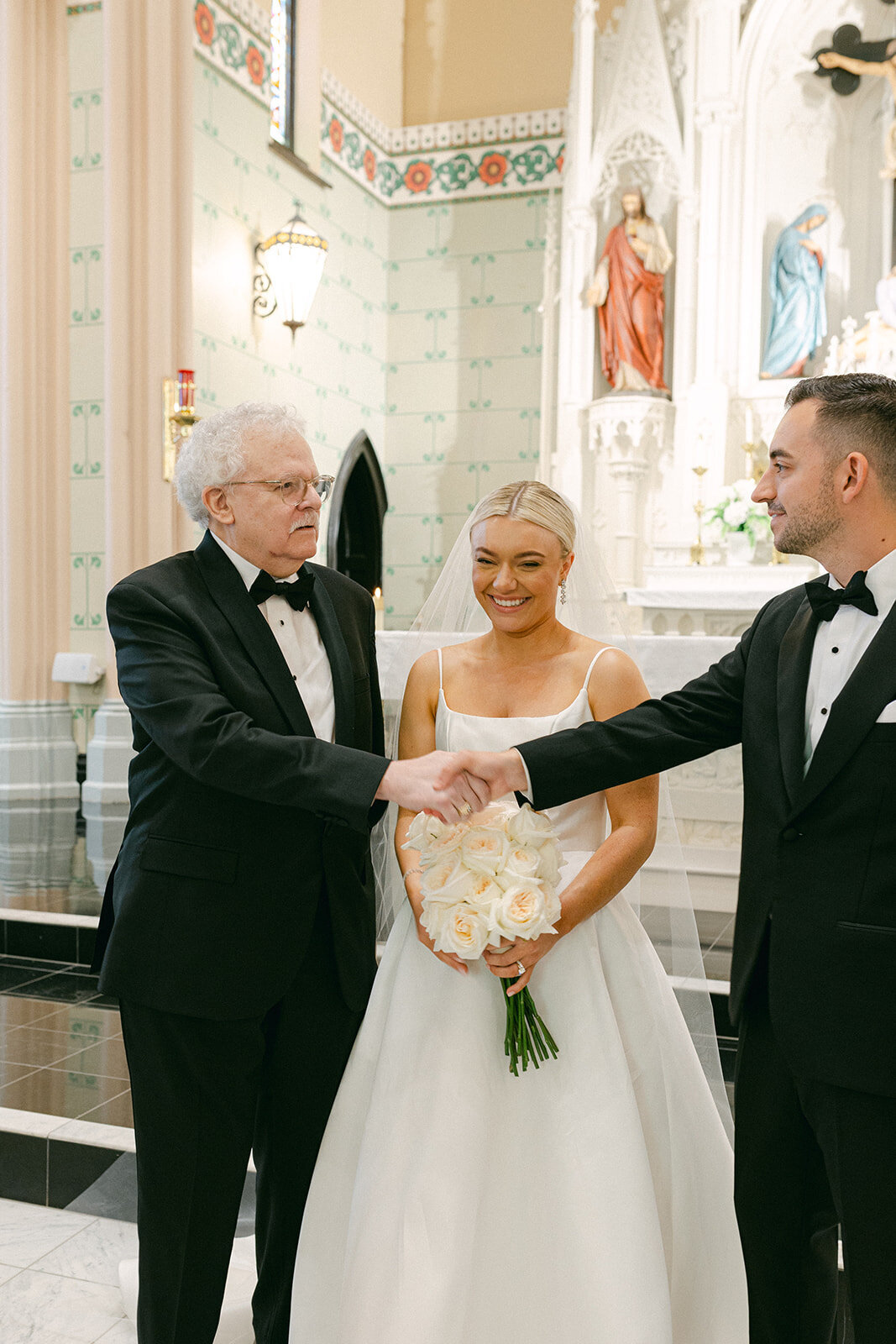 Bride and groom celebrating at the Omni William Penn Hotel wedding in Pittsburgh