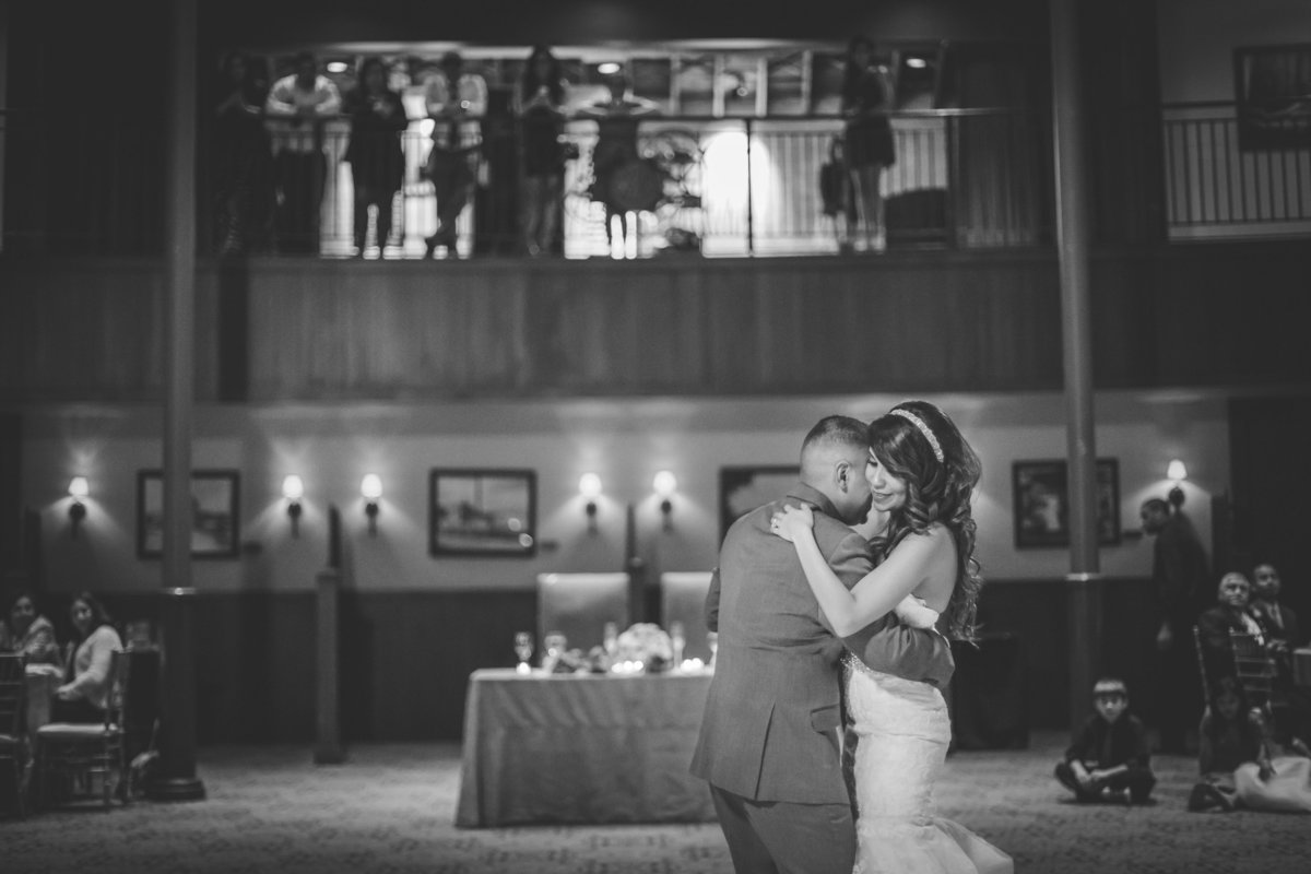 first dance of bride and groom at The Historic Pearl Stables wedding venue in black and white