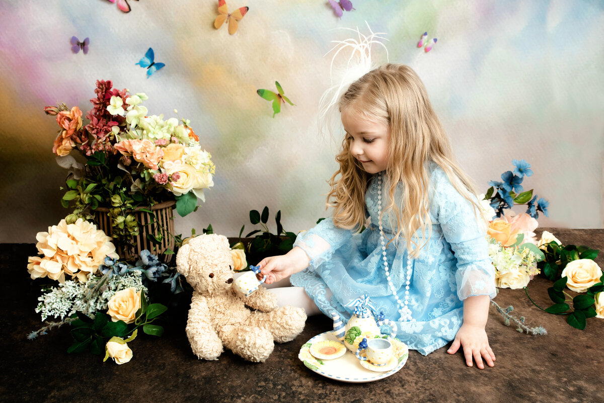 little girl celebrates third birthday with a tea party
