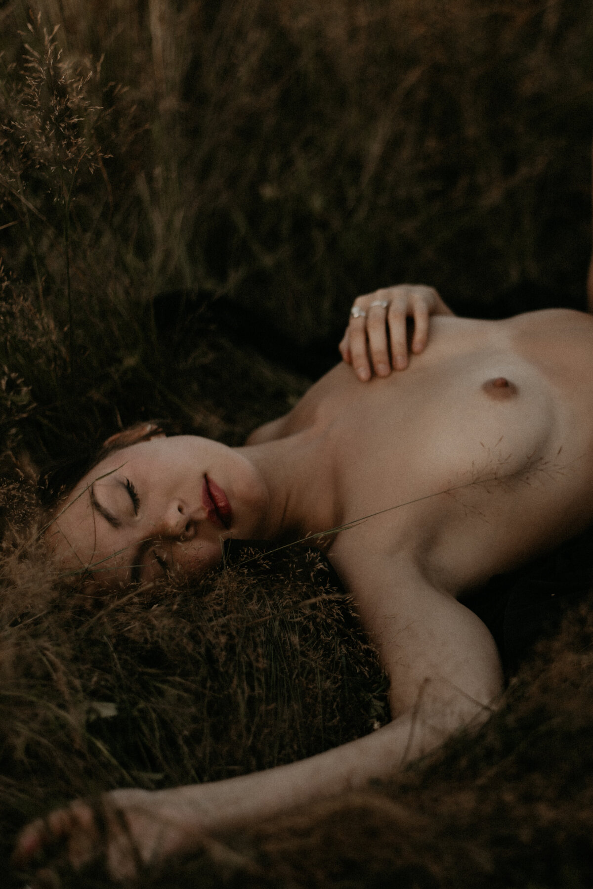 nude girl in a field