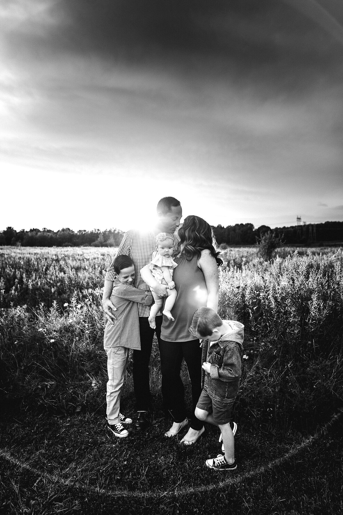 Black and White Family in Field
