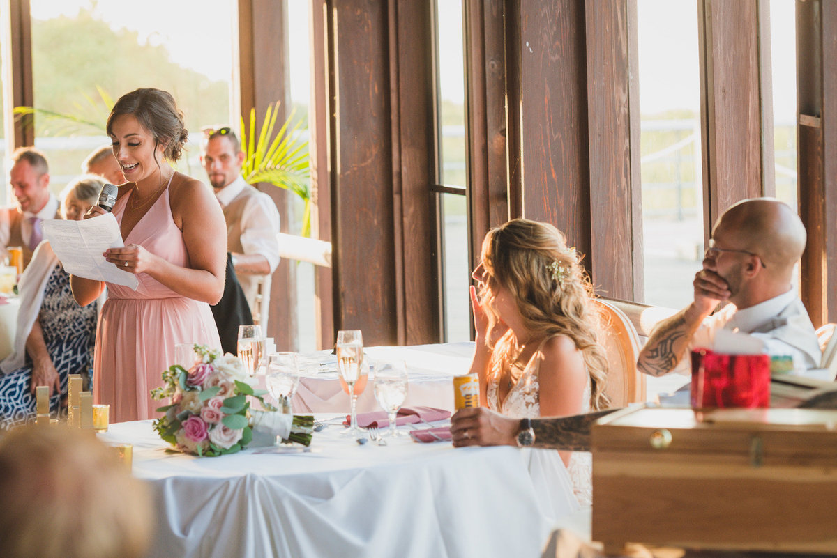 photo of maid of honor giving speech during wedding reception at Pavilion at Sunken Meadow