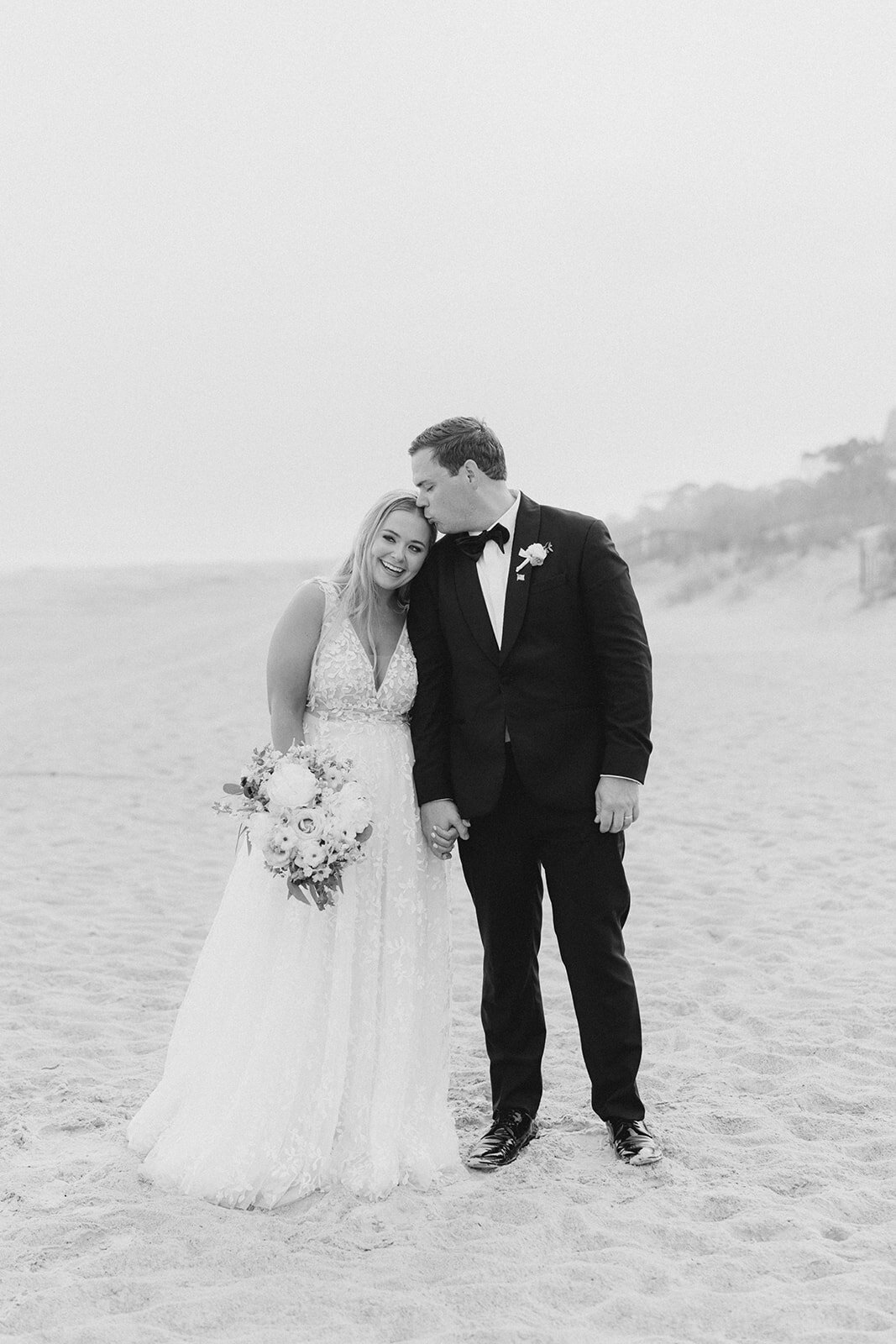 Sea Pines fall wedding. Bride and groom black and white portrait on the beach. Kailee DiMeglio Photography, Charleston, SC based destination wedding photographer.