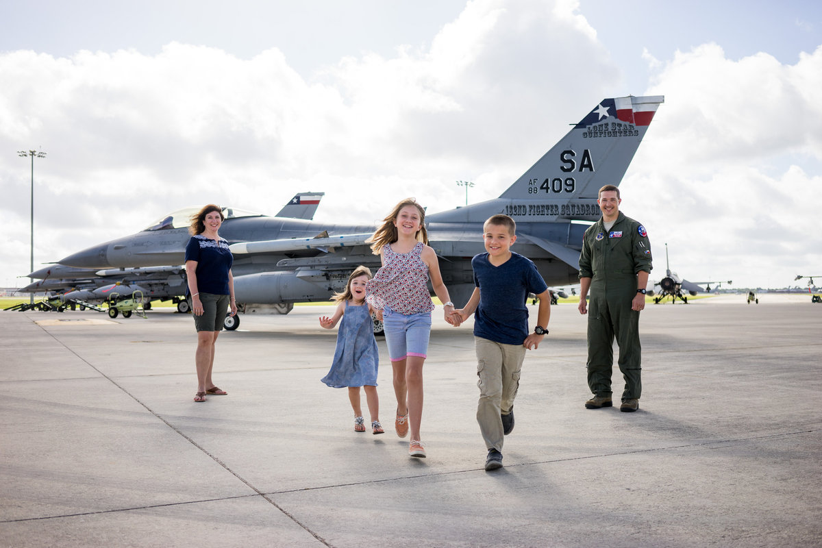 family portrait session of plane on air force base by San Antonio Photographer Expose The Heart Photography