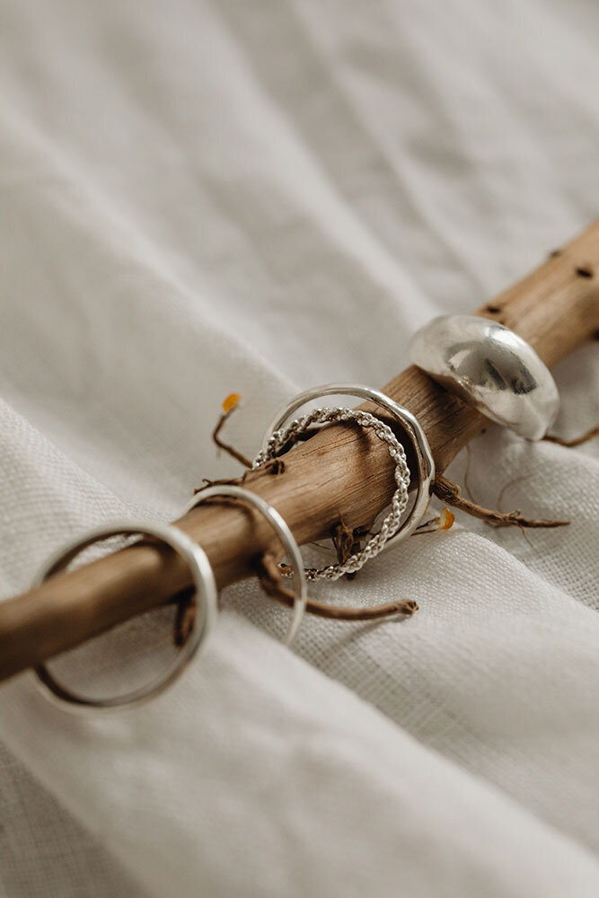 kaboompics_silver-jewelry-wood-and-marble-29619