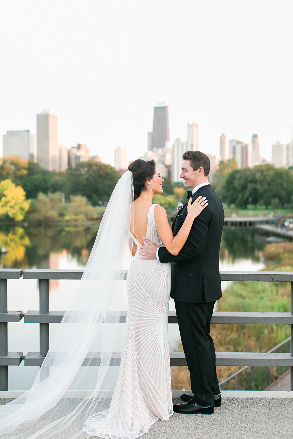 A posed portrait of a bride and groom on their wedding day in Lincoln Park