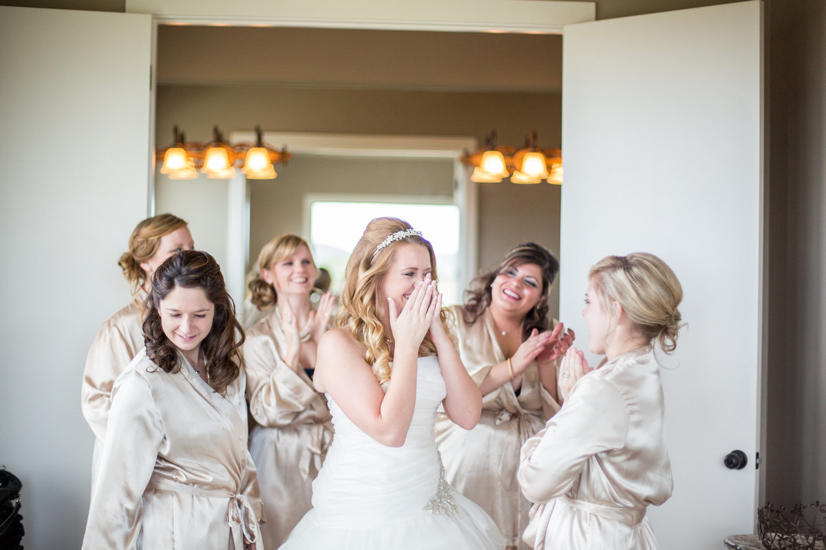 Bride crying with bridesmaids during getting ready just before wedding ceremony at Paniolo Ranch venue Texas Hill Country