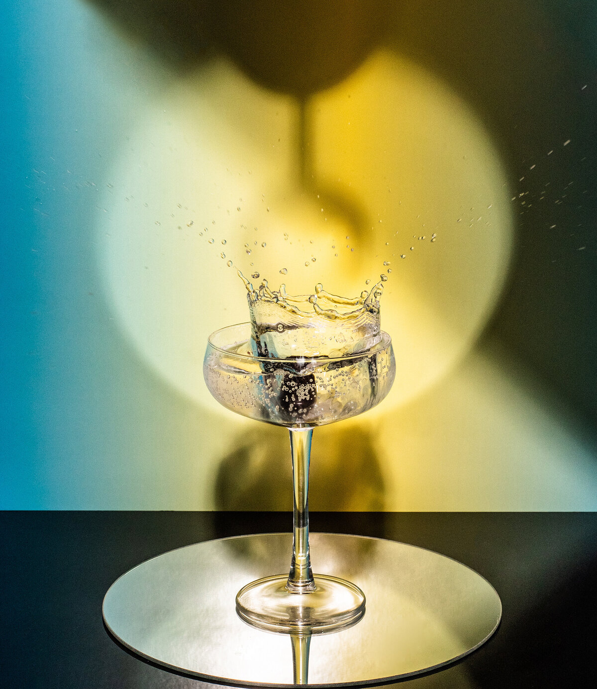 a splash into a cocktail glass