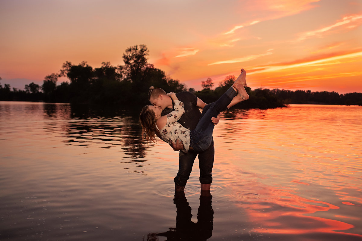 Engaged couple at sunset in Iowa