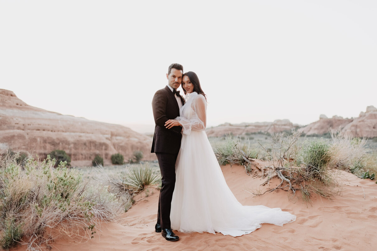 Utah elopement photographer captures couple hugging during bridal portraits