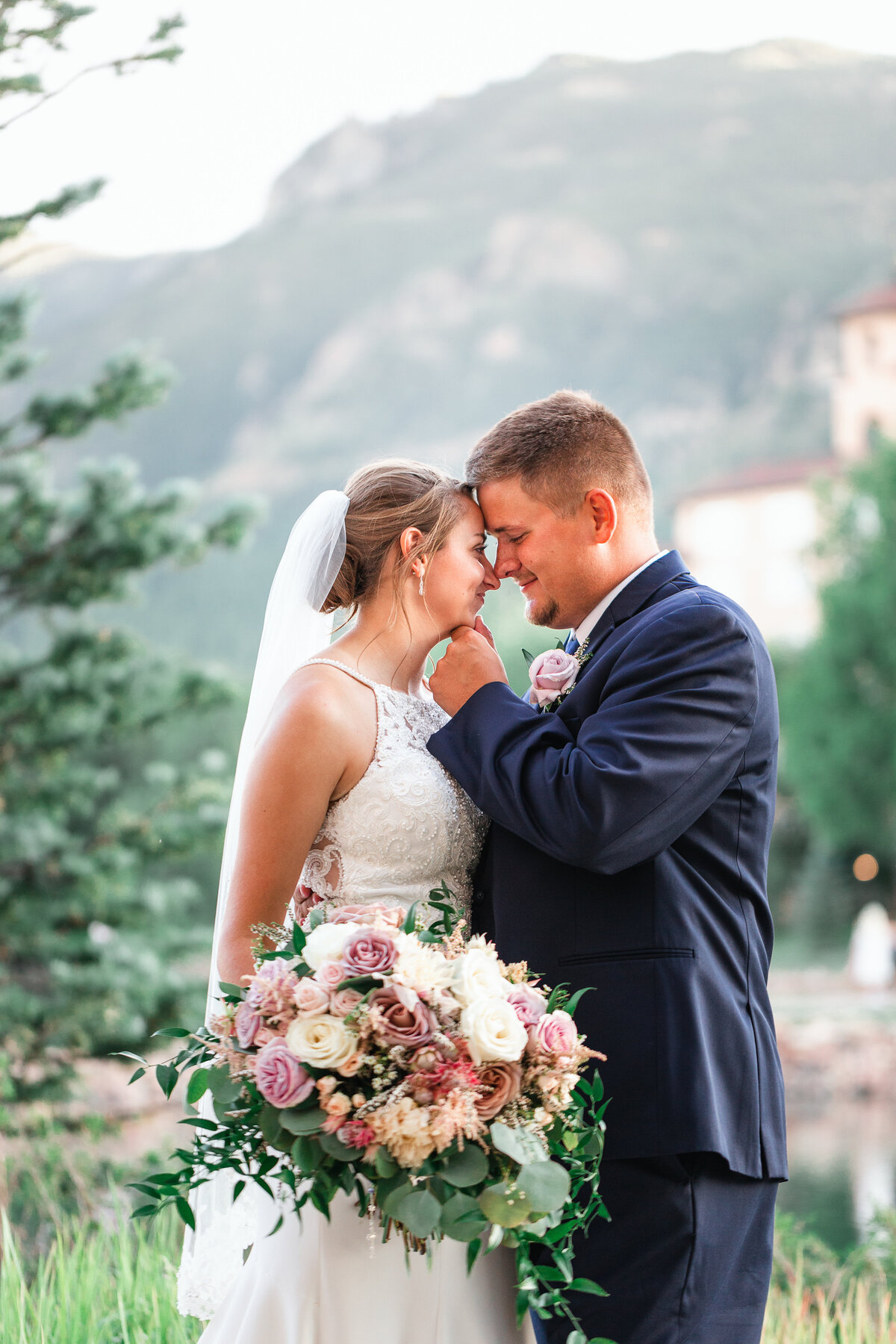 Bride and Groom Embrace at the Broadmoor