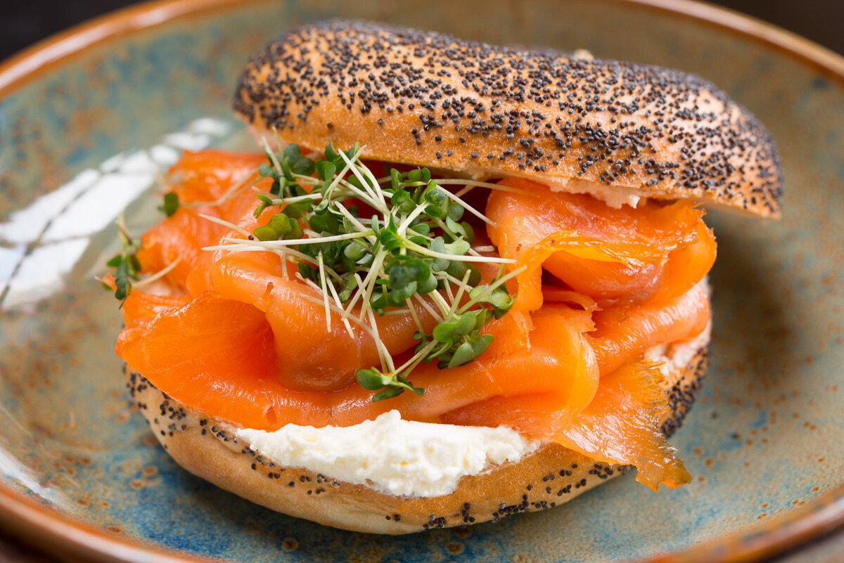 smoked salmon and cream cheese bagel with sesame seeds
