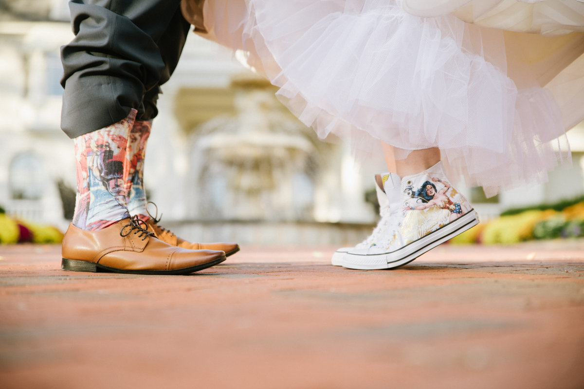 funny fun quirky unique wedding photography superheroes personality candid wedding photography tulle tippy toes shoes converse