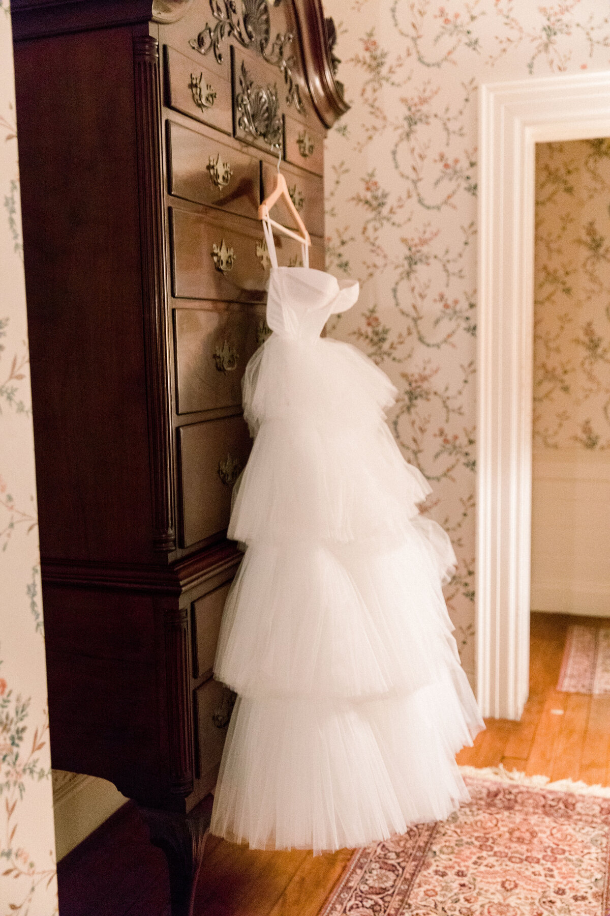 wedding dress hanging for wedding at the Lyman Estate in Waltham Massachusetts.
