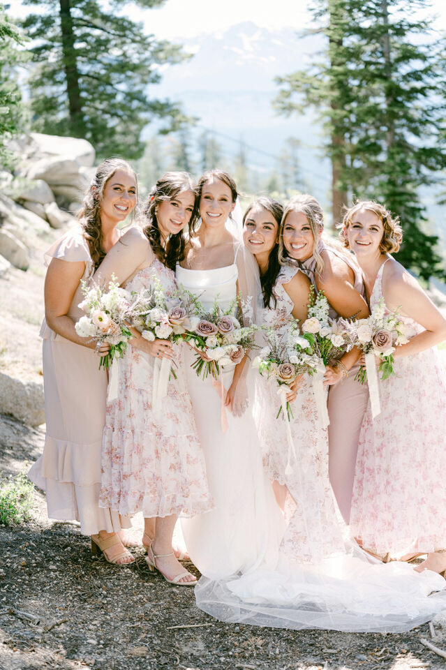 Bride with bridesmaids in pink gowns