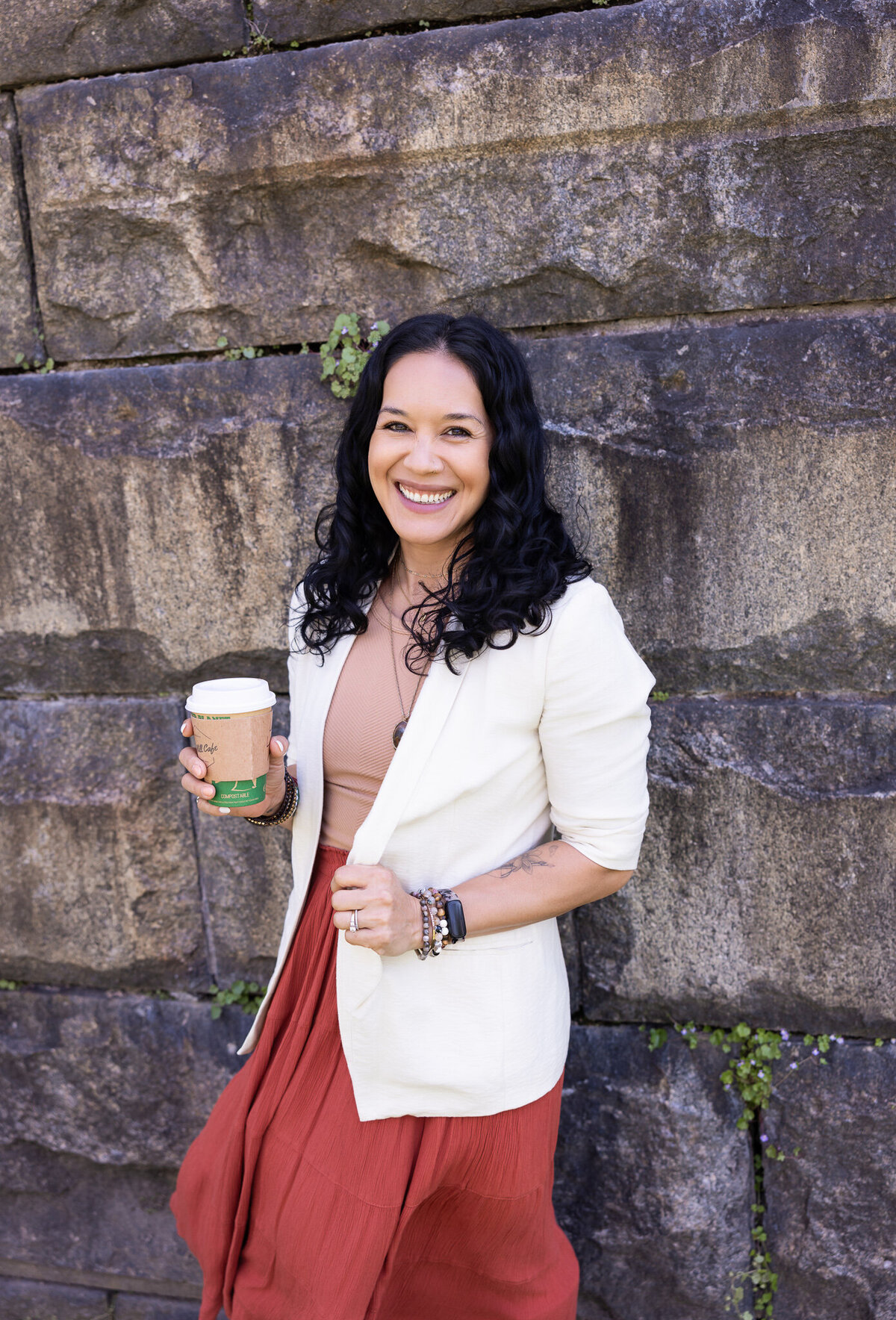 small-business-owner-drinks-coffee-during-her-brand-session-in-baltimore-maryland-with-brand-photographer-ingrid-berrios