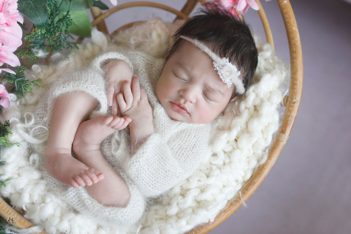 Oakville-newborn-photography-studio-with-a-newborn-baby-sleeping-for-her-photoshoot