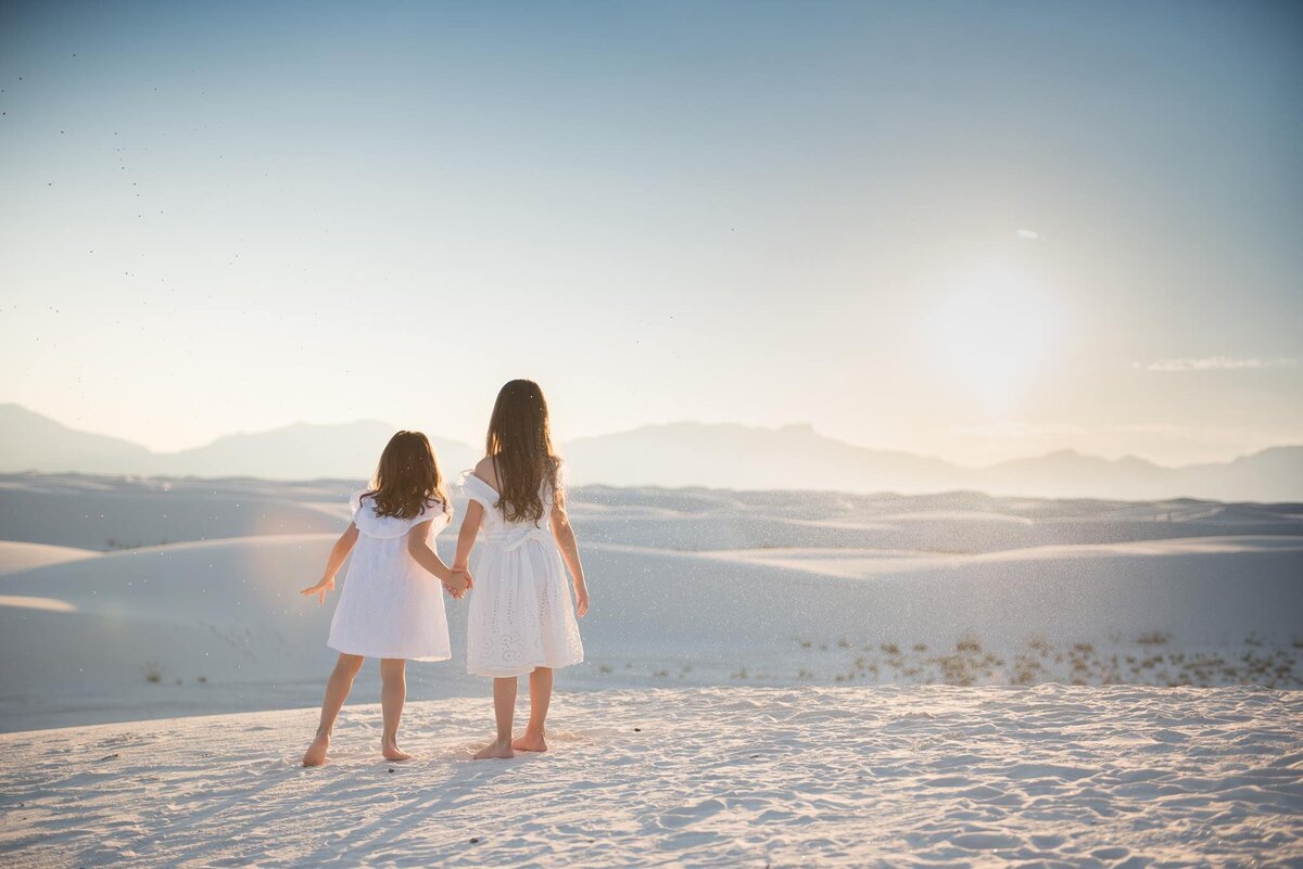 White Sands New Mexico little girls holding hands