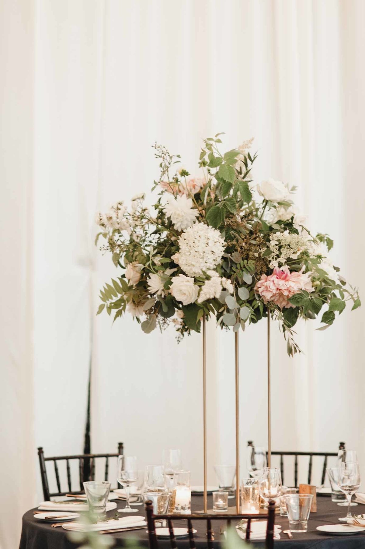 Romantic cream, green and blush elevated wedding floral arrangement created for our luxe Seattle wedding