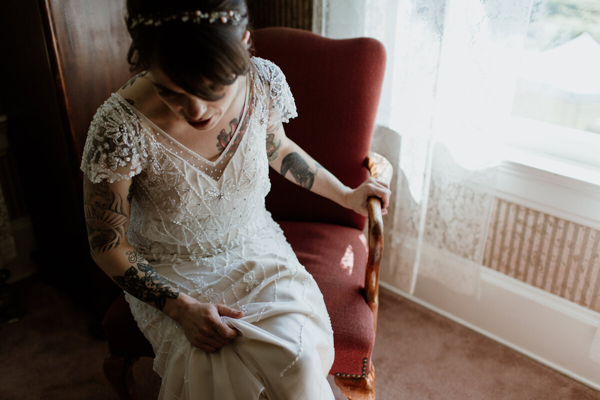 A tattooed bride getting ready for her big day captured by Fort Worth wedding photographer, Megan Christine Studio