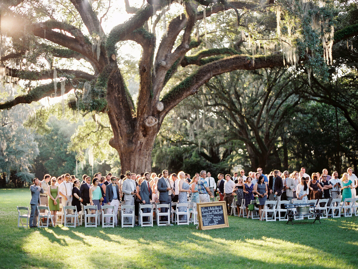 Wedding Ceremony under oak tree at Legare Waring House
