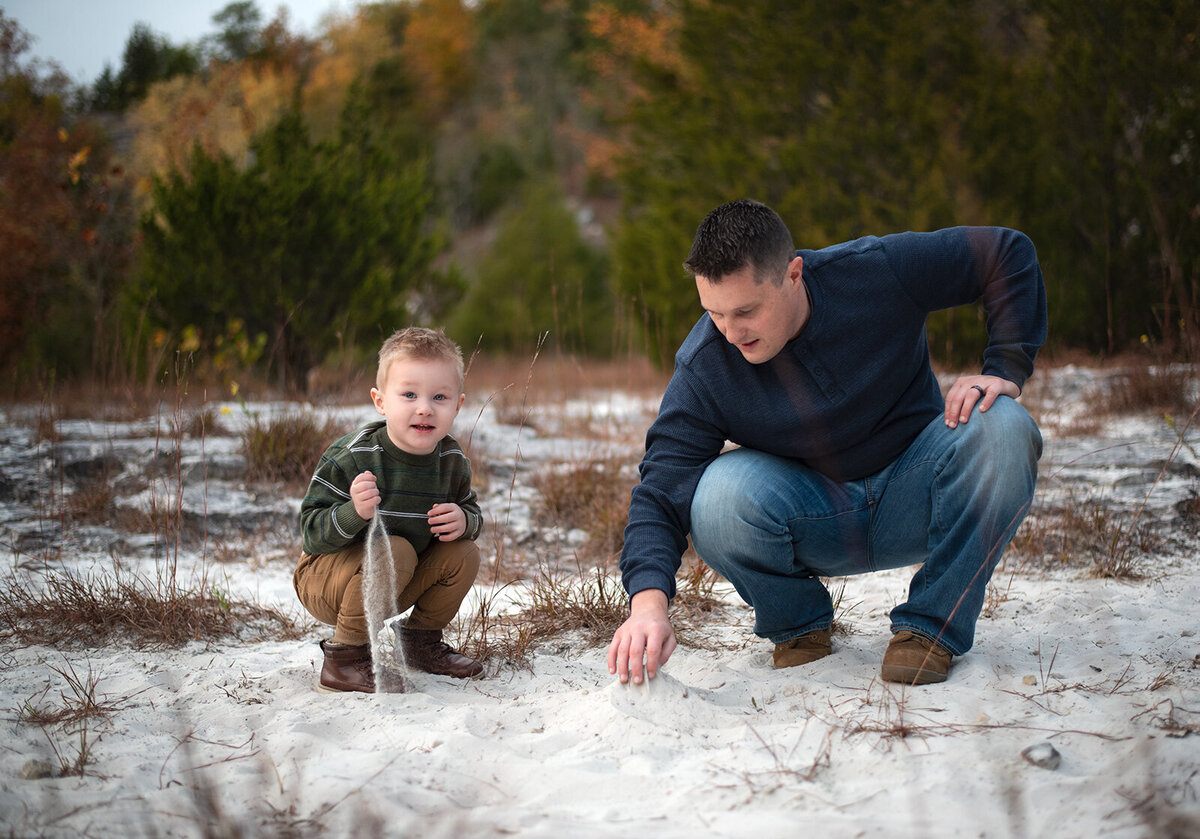 dad and son playing in sand at saint louis missouri family photography session