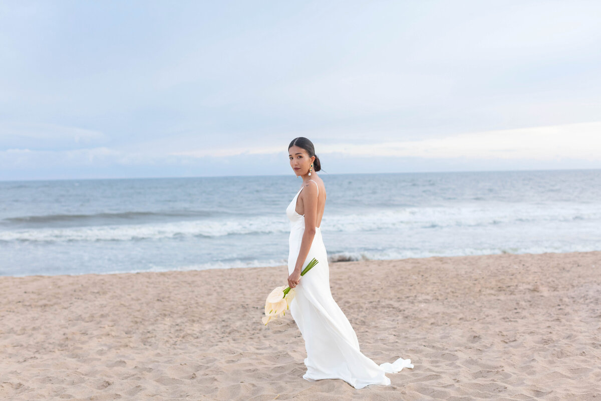 Capture the romance of a Bonnet Island Estate wedding with a stunning dockside portrait. Elegant, timeless wedding photography by a top New Jersey wedding photographer.