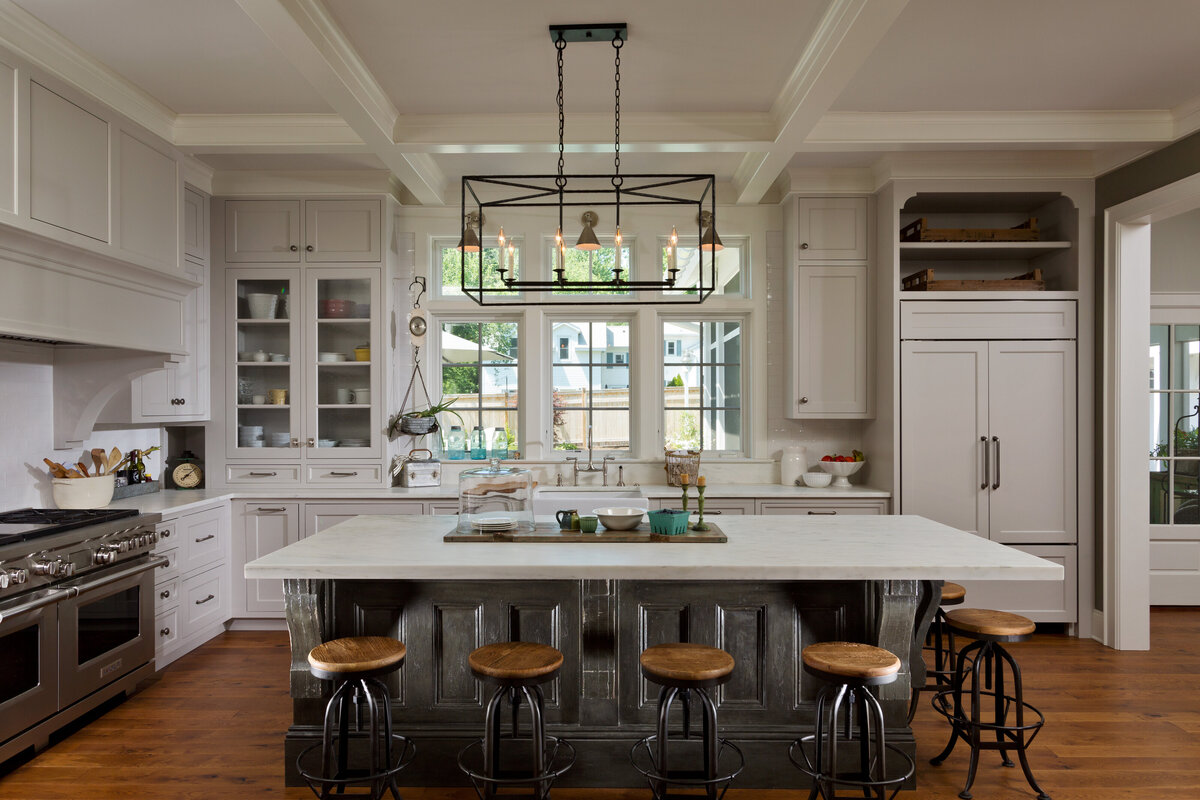 Light kitchen with wood accents and white cabinets