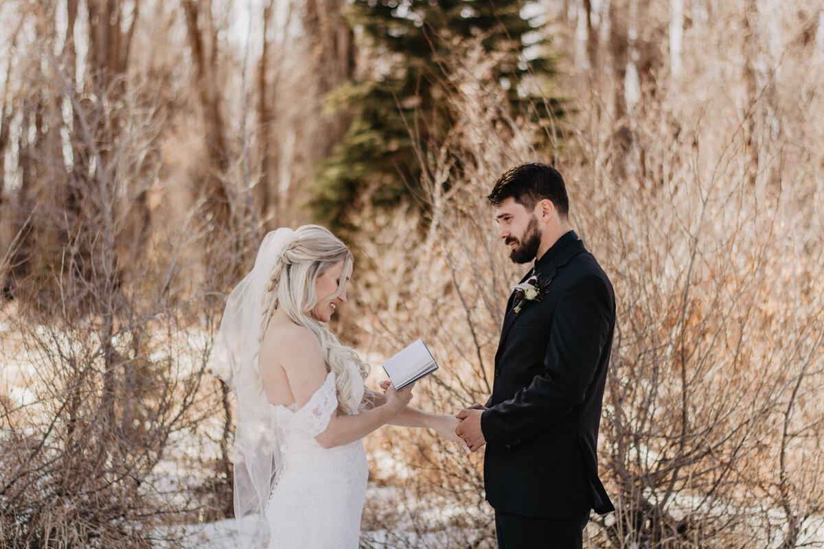 Jackson Hole Photographers capture bride reading vows during private vow reading