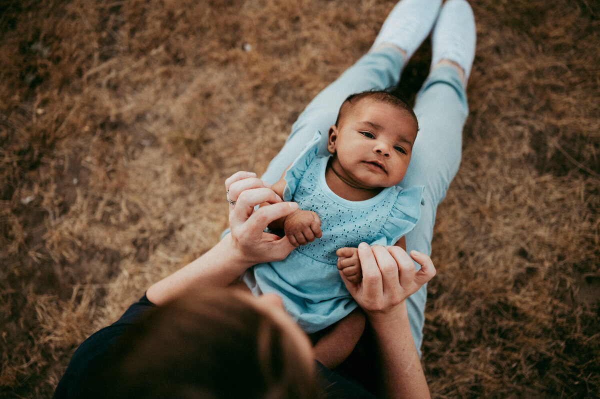 baby and mom photographed by portland newborn photographer evelynne gomes greenberg