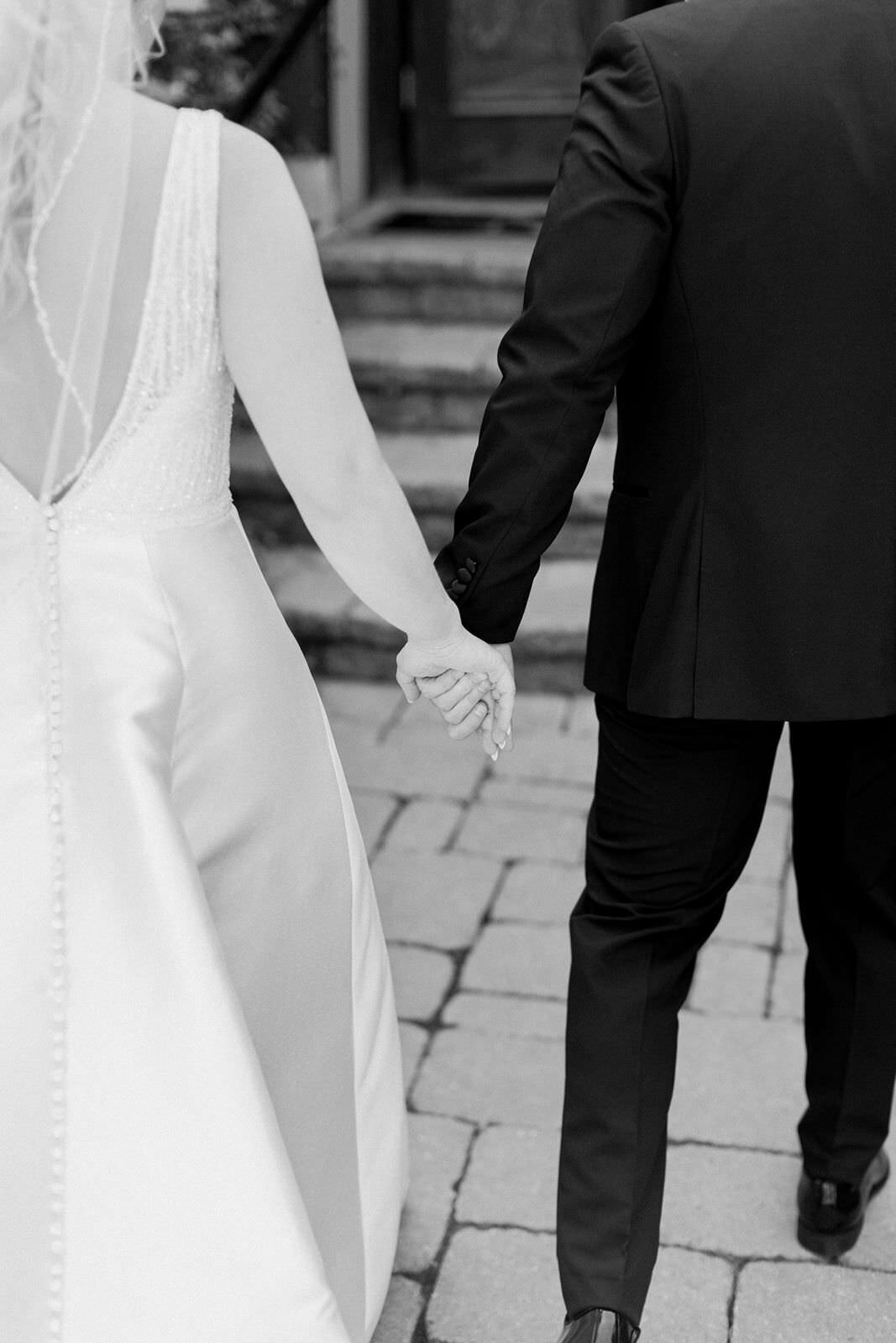 bride-groom-holding-hands-sarah-sunstrom-photography-monte-bello-estate-wedding
