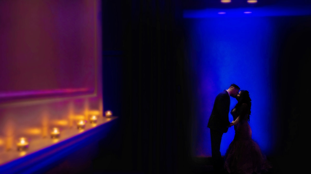 Bride and groom kissing at Crest Hollow Country Club