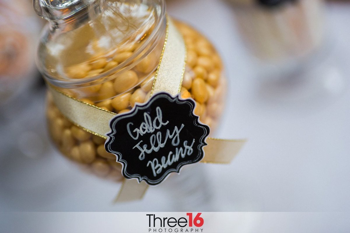 Gold jelly  beans on the wedding reception dessert table