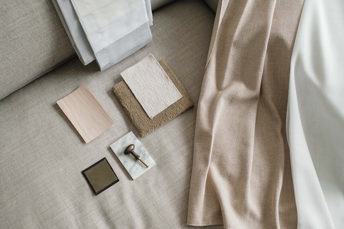 kaboompics_interior-design-material-board-home-styling-a-neutral-color-scheme-fabric-samples-35124