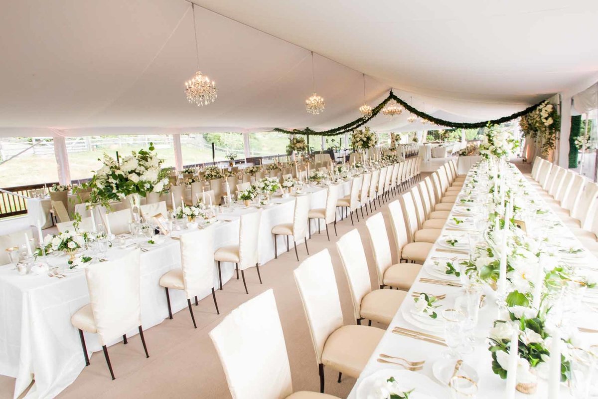 Wedding reception in large white tent on private estate in Seattle.