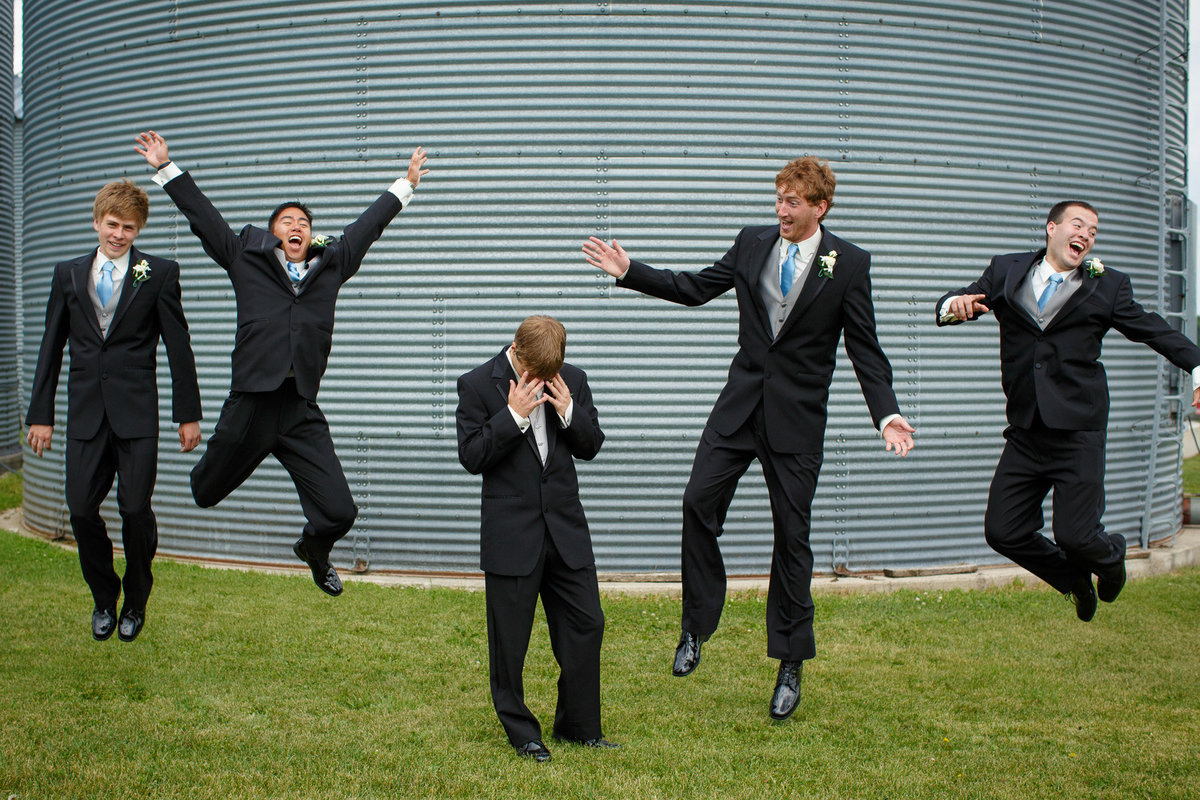 jumping wedding party while the groom is super embarrassed about it