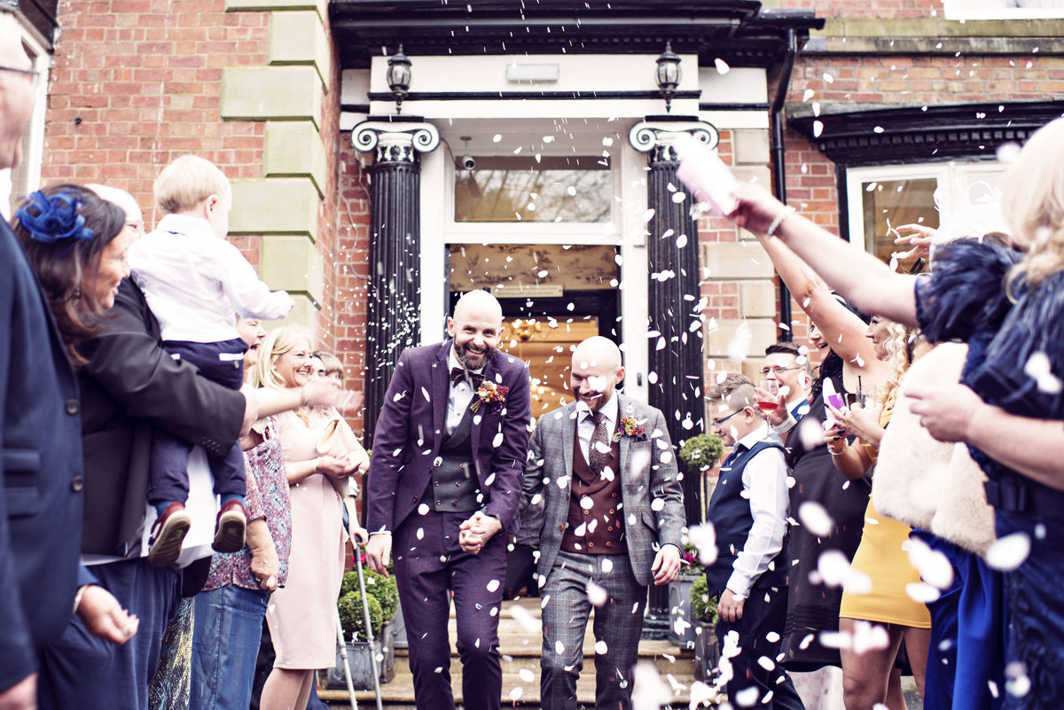 Groom and Groom Confetti Shot at Ashfield House